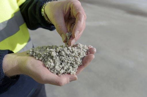 A person holds processed lithium. Lithium mining is being proposed on the Canadian Prairies. 