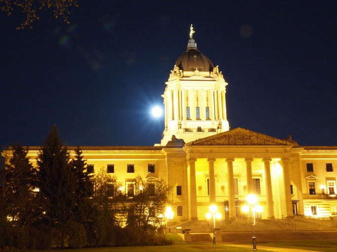 Manitoba legislature at night. The Manitoba government has incentivized lithium mining on the Prairies.